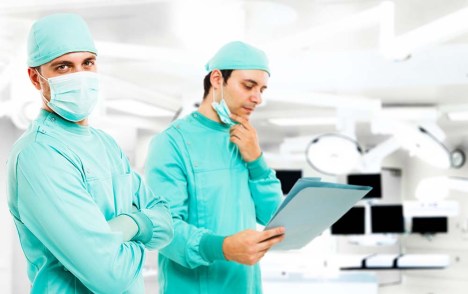 Portrait of two surgeons in a operating theatre